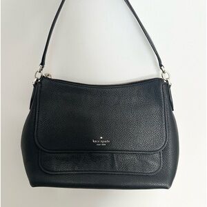 Black Kate Spade bag.